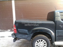 Крышка алюминиевая трехсекционная Ruggedliner на Toyota Hilux (2006-2014) -726682