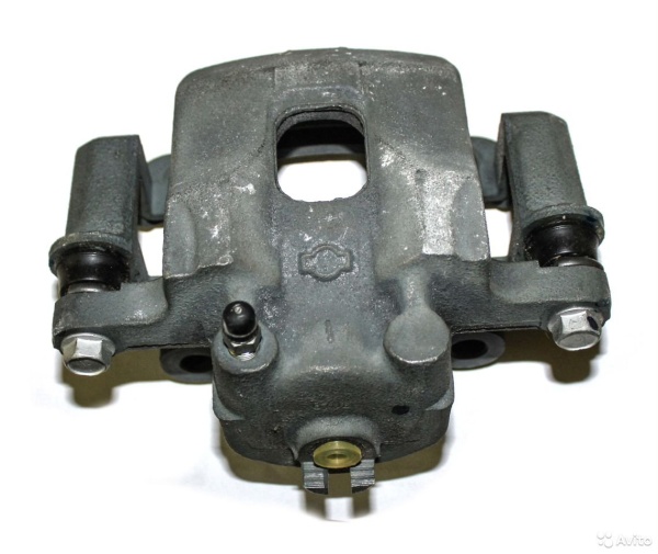 Суппорт тормозной передний правый Nissan 41001-09W00