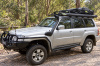 Оборудование Ironman на автомобиле: Пороги (подножки) с защитой крыльев для Toyota Hilux 2005-2014 Ironman SSR001