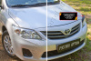 Накладки на передние фары (реснички) Toyota Corolla (140,150 рест.) 2010-2013 (седан) глянец RET-080100