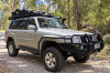 Оборудование Ironman на автомобиле: Пороги (подножки) с защитой крыльев для Toyota Hilux 2005-2014 Ironman SSR001