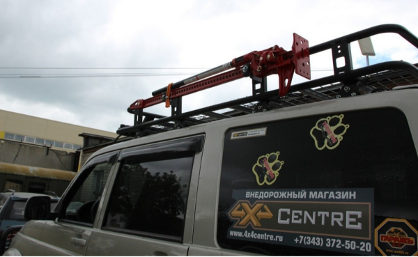 Крепление реечного домкрата на экспедиционный багажник RIVAL UAZ Patriot D.6311.1